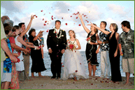 Family and friends celebrating happy couple