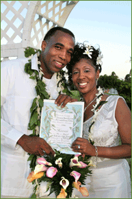 Happy couple showing their wedding certificate