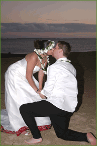 Kissing couple by sunset